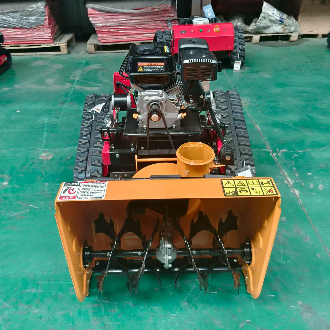 Track-type chassis empowerment: Integrated grass-cutting and snow-clearing equipment